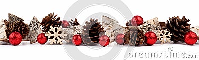 Christmas border with rustic wood tree ornaments, baubles and pine cones isolated over white Stock Photo