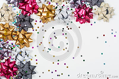 Christmas bows with confetti Stock Photo