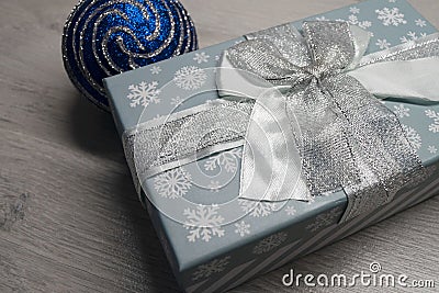 Christmas box with snowflakes and aChristmas ball Stock Photo