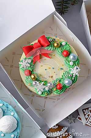 Christmas Cake, Festive Bento Cake, New Year Dessert on Bright Background Stock Photo