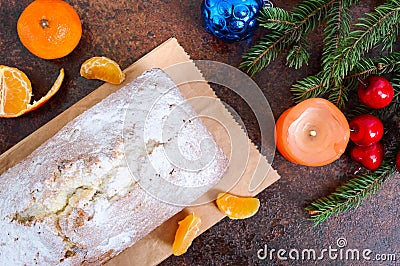 Christmas cake with nuts, dried fruit, tangerines. Stock Photo