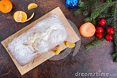 Christmas cake with nuts, dried fruit, tangerines. Stock Photo