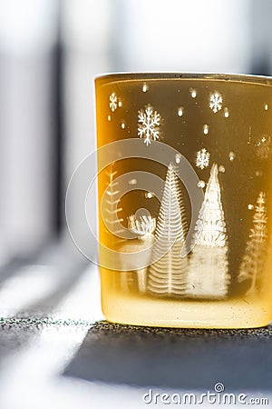 Christmas candle glass in sunny day Stock Photo