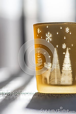 Christmas candle glass in sunny day Stock Photo