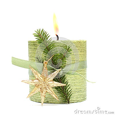 Christmas candle, green ribbon and gold star Stock Photo