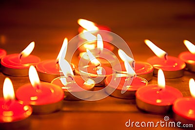 Christmas candles pentagram star on wood Stock Photo