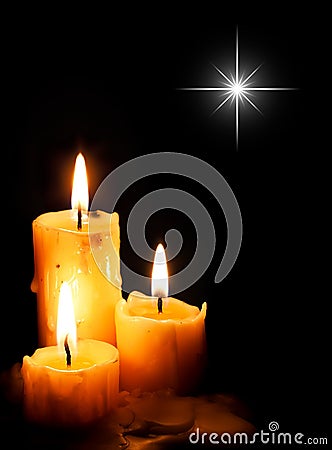 Christmas Candles with star light Stock Photo