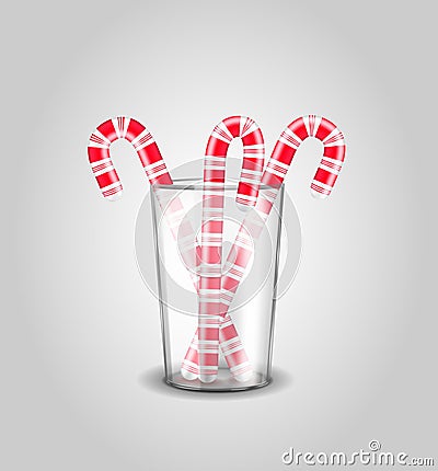 Christmas candy cane in a transparent glass Stock Photo