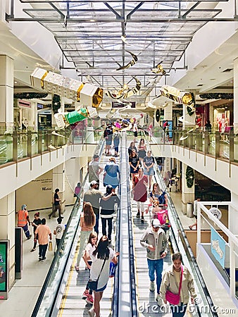 Christmas candy decoration, under the skylight, above the escalator. Vertical photo image. Editorial Stock Photo