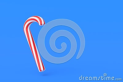 Christmas cane, candy with red stripes on blue background Stock Photo