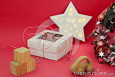 Christmas card with Holiday decor, wreath and presents for Kids top view banner. Ecological Baby toys flatly Stock Photo