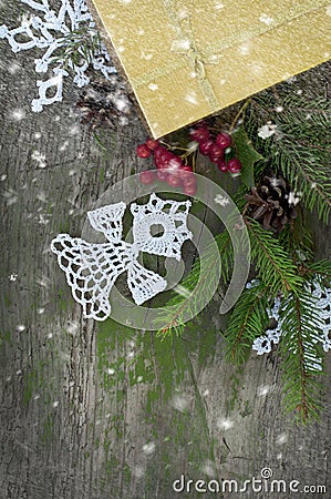 Christmas card with knitted angel and snow Stock Photo