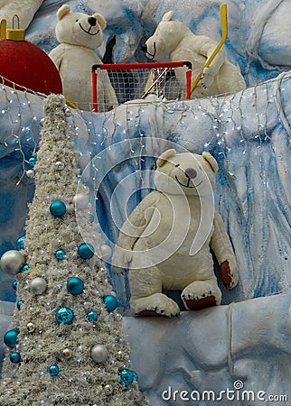 Christmas card, three polar bears and a Christmas tree. Spruce with toys, toy bears all form a Christmas composition Stock Photo