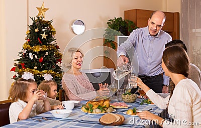 Christmas celebration in the bosom of family Stock Photo