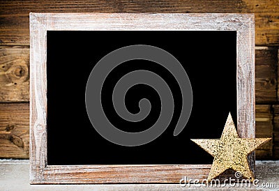 Christmas chalkboard with decoration. Santa hat, stars, Wooden Stock Photo