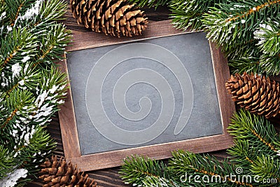 Christmas chalkboard and fir tree Stock Photo