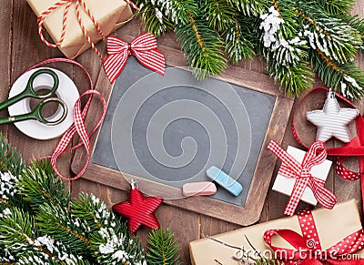 Christmas chalkboard, gift boxes, decor Stock Photo