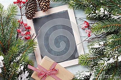 Christmas chalkboard, tree and gift box Stock Photo