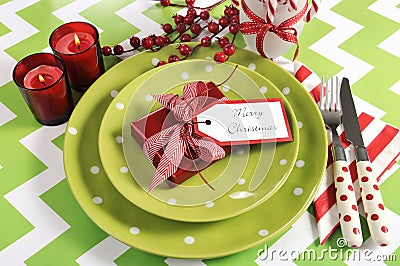 Christmas children family party table place settings in lime green, red and white Stock Photo