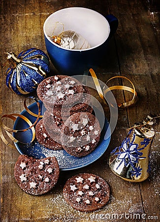 Christmas chocolate cookies over wooden background Stock Photo
