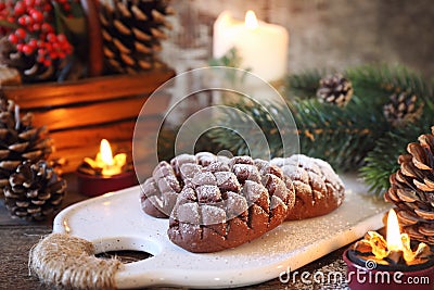 Christmas chocolate pine cone shortbread cookie and New Year`s decoration Stock Photo