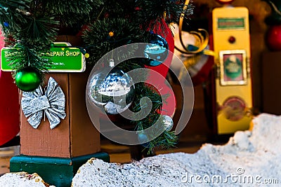 Christmas coming, toys, dwarfs, snow, snowman, Santa Claus, decoration, Christmas tree, bear, light, people Editorial Stock Photo