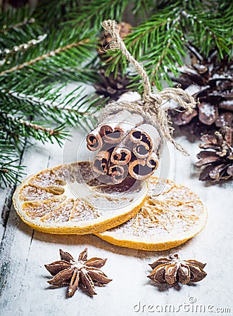 Christmas composition with anise stars, pine cones and dried orange Stock Photo