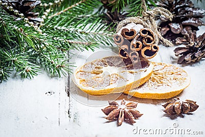 Christmas composition with anise stars, pine cones and dried orange Stock Photo