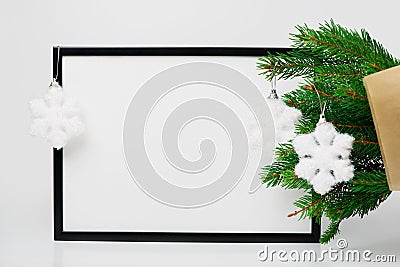 Christmas composition. Black frame and branches christmas tree, Stock Photo