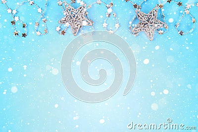 Christmas composition from Christmas tree toys. White decor on a blue background. Copy space, flat lay, top view. Stock Photo