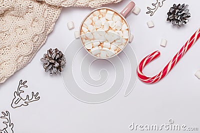 Christmas composition with cocoa, marshmallows, knitted sweater and other Stock Photo