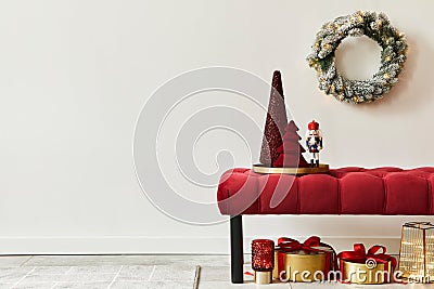 Christmas composition with decoration, christmas tree, gifts, snow and accessories in cozy home decor. Copy space. Stock Photo