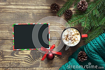 Christmas composition. Empty blank for wishing to Santa and cup of coffee on the wooden board. Top view with copy space. Stock Photo