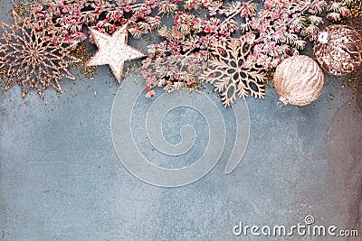 Christmas composition fir tree branches, gold sterne on blue background Stock Photo