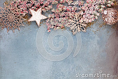 Christmas composition fir tree branches, gold sterne on blue background Stock Photo