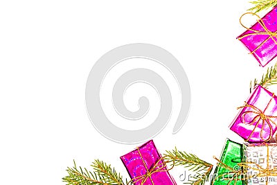 Christmas composition with gift boxes and fir branches are in the corner framing an empty white background for text Stock Photo