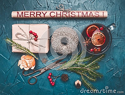 Christmas composition, gift, twine, mulled wine, on a blue background, top view Stock Photo