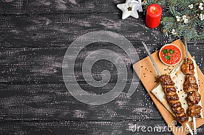 Christmas composition with kebab on wooden table Stock Photo