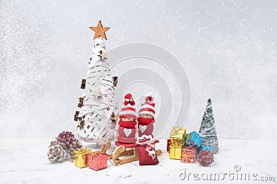Christmas composition with Noel gnomes and small gifts. Copy space Stock Photo