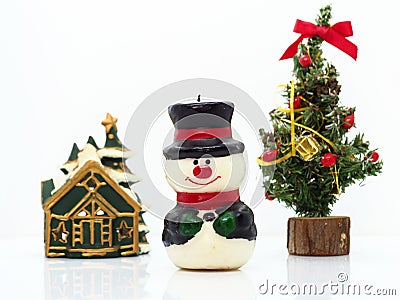 Christmas composition,snowman,house and christmas tree Stock Photo