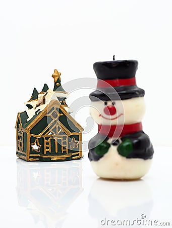 Christmas composition,snowman and small green house Stock Photo