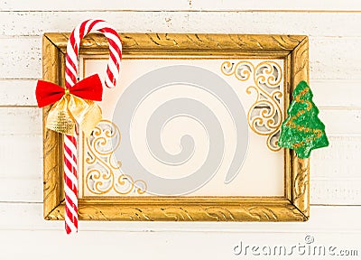 Christmas concept with empty picture frame and cane candy Stock Photo