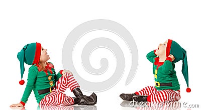 Christmas concept two children cheerful elf looking upisolated Stock Photo