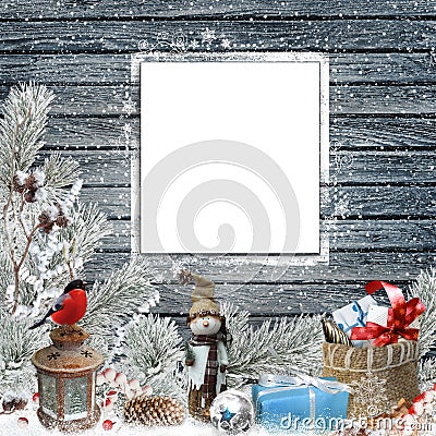 Christmas congratulatory background with frame for text or photo, snowman, gifts, pine branches and Christmas decorations Stock Photo