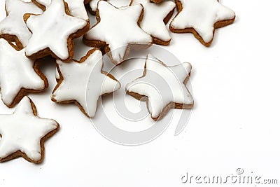 Christmas cookies, cinnamon stars, corner background on white Stock Photo