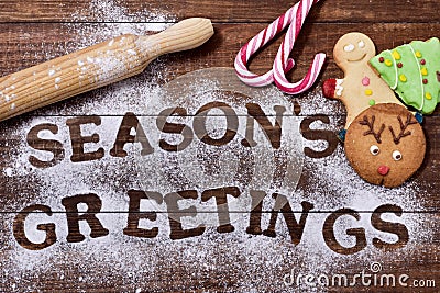 Christmas cookies and text seasons greetings Stock Photo