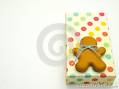 Christmas cookies in wrapped gift box on white background. Christmas baking. Making gingerbread christmas cookies. Christmas conce Stock Photo