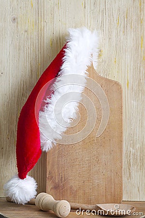 Christmas cooking abstract background with santa claus hat Stock Photo