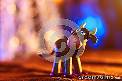 Christmas cow from plasticine Stock Photo