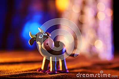 Christmas cow from plasticine Stock Photo